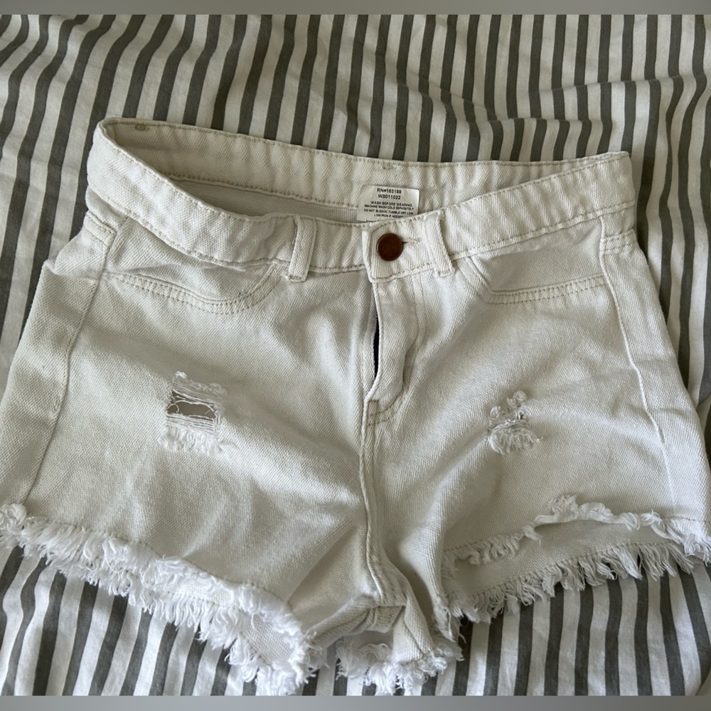 White jean shorts. Junior size small/medium